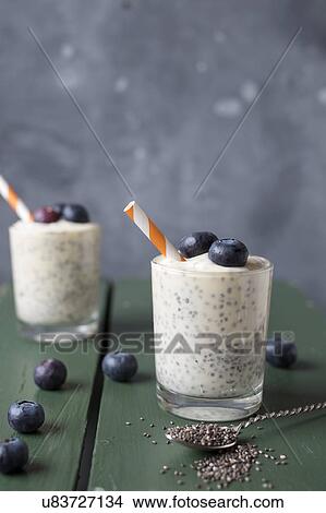 Picture - Smoothie with blueberries and chia seeds. Fotosearch