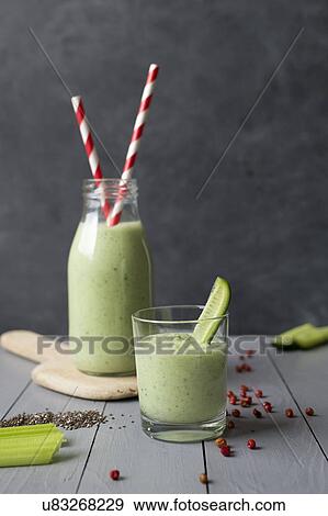 Stock Photo - Smoothie with cucumber, chia seeds and red pepper. Fotosearch