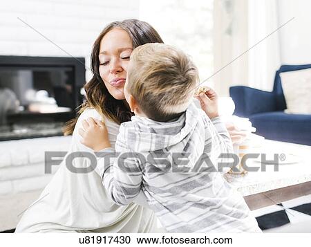 Son (4-5) kissing mother View Large Photo Image Stock Image - Son (4-5) kissing mother. Fotosearch
