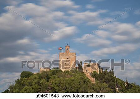 Stock Image - Spain, Andalusia, Granada, Palace of Alhambra on hill. Fotosearch