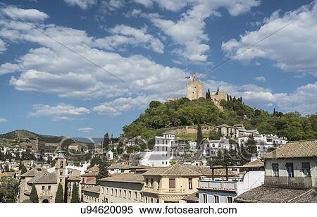 Stock Photography - Spain, Andalusia, Granada, Plaza Nueva, Palace of Alhambra on hill. Fotosearch