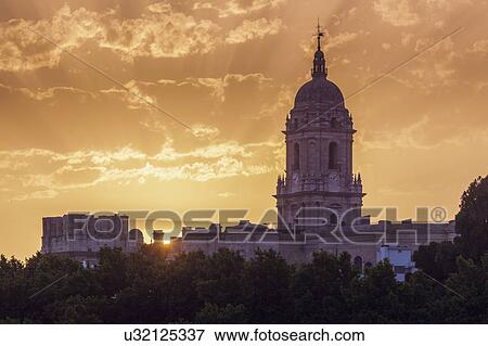 Stock Photo - Spain, Andalusia, Malaga, Malaga Cathedral at sunset. Fotosearch