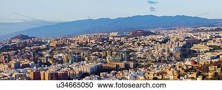 Spain, Canary Islands, Tenerife, Puerto de la Cruz, Panorama of Santa Cruz de Tenerife at sunrise View Large Photo Image Stock Image - Spain, Canary Islands, Tenerife, Puerto de la Cruz, Panorama of Santa Cruz de Tenerife at sunrise. Fotosearch