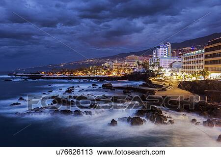 Spain, Canary Islands, Tenerife, Puerto de la Cruz, Puerto de la Cruz at night View Large Photo Image Stock Image - Spain, Canary Islands, Tenerife, Puerto de la Cruz, Puerto de la Cruz at night. Fotosearch