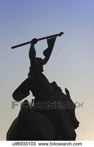 Spain, Seville, Avenida Portugal, Silhouette of equestrian statue View Large Photo Image Stock Image - Spain, Seville, Avenida Portugal, Silhouette of equestrian statue. Fotosearch