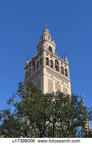 Stock Photograph - Spain, Seville, Facade of Giralda Tower. Fotosearch
