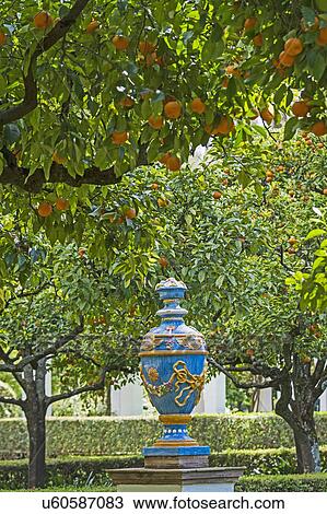 Stock Image - Spain, Seville, Maria Luisa Park, Ornate statue in park. Fotosearch