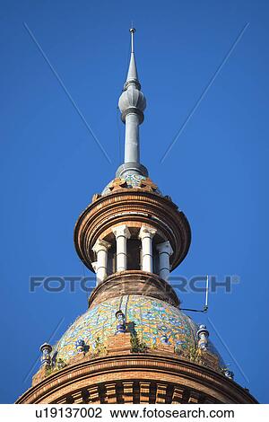 Spain, Seville, Plaza De Espana, High section of ornate tower View Large Photo Image Stock Image - Spain, Seville, Plaza De Espana, High section of ornate tower. Fotosearch