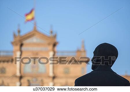 Spain, Seville, Plaza De Espana, Silhouette of male statue with building in background View Large Photo Image Stock Photo - Spain, Seville, Plaza De Espana, Silhouette of male statue with building in background. Fotosearch