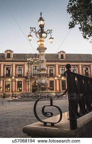 Picture - Spain, Seville, Plaza Virgin De Los Reyes, Town square at dusk. Fotosearch