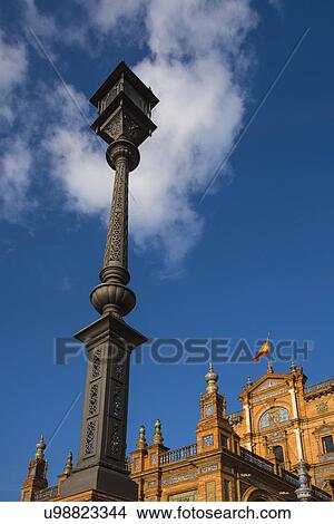 Picture - Spain, Seville, Traditional streetlight at Plaza De Espana. Fotosearch