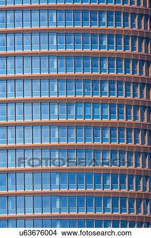 Picture - Spain, Seville, Triana, Facade of modern office building. Fotosearch