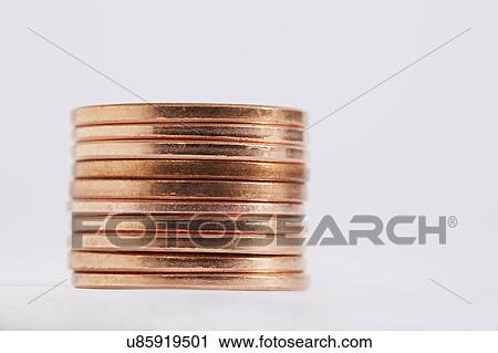 Stack of coins on white background View Large Photo Image Stock Image - Stack of coins on white background. Fotosearch