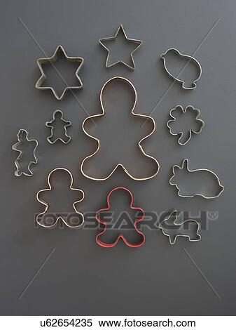 Stock Photography - Studio shot of cookie cutters on grey background. Fotosearch