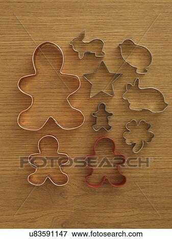 Stock Photo - Studio shot of cookie cutters on wooden table. Fotosearch
