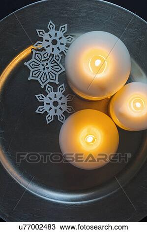Three candles and Christmas ornaments on tray View Large Photo Image Stock Image - Three candles and Christmas ornaments on tray. Fotosearch