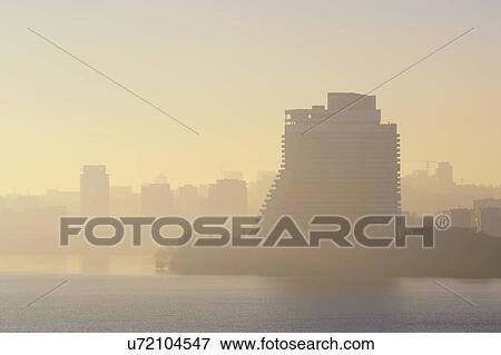 Ukraine, Dnepropetrovsk, City skyline at foggy dawn View Large Photo Image Stock Photo - Ukraine, Dnepropetrovsk, City skyline at foggy dawn. Fotosearch
