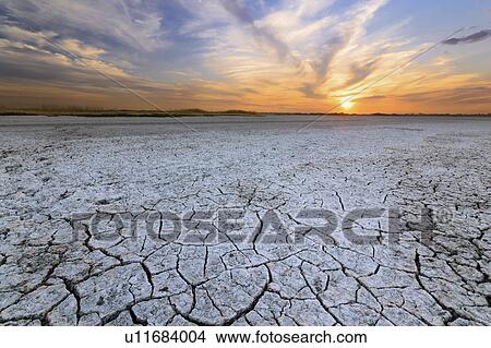 Ukraine, Dnepropetrovsk Region, Novomoskovskiy District, Lake Soleniy Lyman, Desert at sunset View Large Photo Image Picture - Ukraine, Dnepropetrovsk Region, Novomoskovskiy District, Lake Soleniy Lyman, Desert at sunset. Fotosearch
