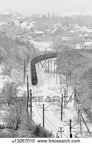 Ukraine, Dnepropetrovsk region, Dnepropetrovsk city, railroad track in winter View Large Photo Image Stock Image - Ukraine, Dnepropetrovsk region, Dnepropetrovsk city, railroad track in winter. Fotosearch