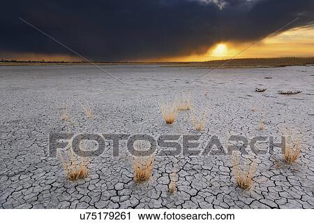 Ukraine, Dnepropetrovsk Region, Novomoskovskiy District, Lake Soleniy Lyman, Stormy clouds over desert View Large Photo Image Stock Image - Ukraine, Dnepropetrovsk Region, Novomoskovskiy District, Lake Soleniy Lyman, Stormy clouds over desert. Fotosearch