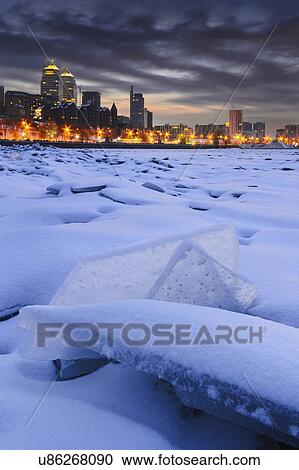 Ukraine, Dnepropetrovsk region, Dnepropetrovsk city, Frozen river with distant city skyline at dusk View Large Photo Image Stock Image - Ukraine, Dnepropetrovsk region, Dnepropetrovsk city, Frozen river with distant city skyline at dusk. Fotosearch