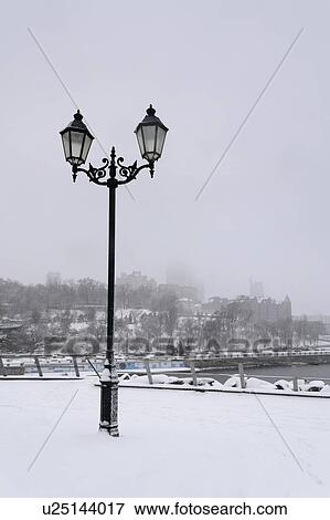 Stock Photo - Ukraine, Dnepropetrovsk Region, Dnepropetrovsk city, Old fashioned streetlight on observation deck. Fotosearch