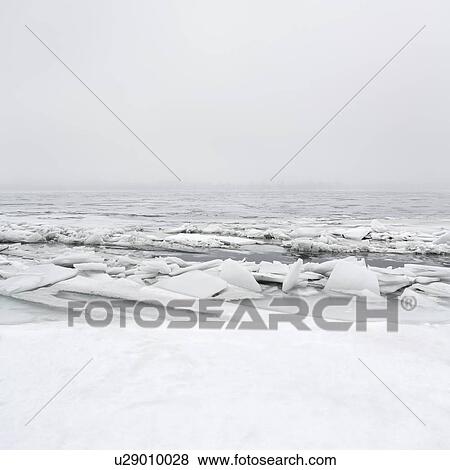 Ukraine, Dnepropetrovsk region, Dnepropetrovsk city, Frozen river with lumps of ice View Large Photo Image Stock Photo - Ukraine, Dnepropetrovsk region, Dnepropetrovsk city, Frozen river with lumps of ice. Fotosearch