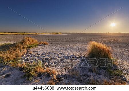 Ukraine, Dnepropetrovsk Region, Novomoskovskiy District, Lake Soleniy Lyman, Desert at sunset View Large Photo Image Stock Photo - Ukraine, Dnepropetrovsk Region, Novomoskovskiy District, Lake Soleniy Lyman, Desert at sunset. Fotosearch