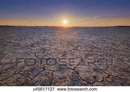 Ukraine, Dnepropetrovsk Region, Novomoskovskiy District, Lake Soleniy Lyman, Desert at sunset View Large Photo Image Stock Photo - Ukraine, Dnepropetrovsk Region, Novomoskovskiy District, Lake Soleniy Lyman, Desert at sunset. Fotosearch