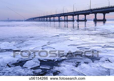 Ukraine, Dnepropetrovsk region, Dnepropetrovsk city, Bridge over frozen river View Large Photo Image Stock Photograph - Ukraine, Dnepropetrovsk region, Dnepropetrovsk city, Bridge over frozen river. Fotosearch