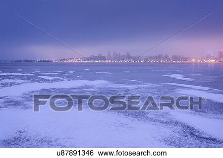 Ukraine, Dnepropetrovsk region, Dnepropetrovsk city, Dramatic sky over frozen river at dusk View Large Photo Image Stock Photograph - Ukraine, Dnepropetrovsk region, Dnepropetrovsk city, Dramatic sky over frozen river at dusk. Fotosearch