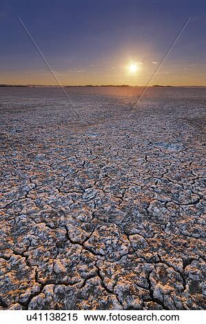 Stock Photography - Ukraine, Dnepropetrovsk Region, Novomoskovskiy District, Lake Soleniy Lyman, Desert at sunset. Fotosearch
