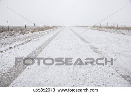 USA, Colorado, Empty dirt road covered with snow View Large Photo Image Stock Image - USA, Colorado, Empty dirt road covered with snow. Fotosearch