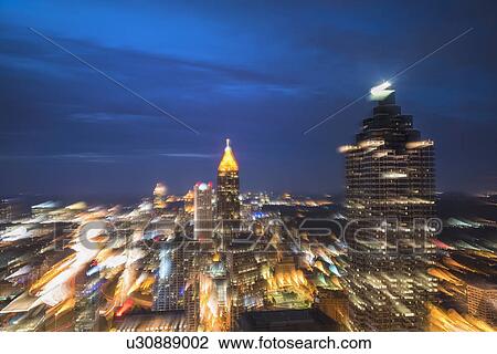 USA, Georgia, Atlanta, Blurred motion of cityscape at dusk View Large Photo Image Stock Image - USA, Georgia, Atlanta, Blurred motion of cityscape at dusk. Fotosearch