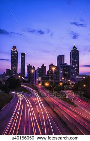 Stock Image - USA, Georgia, Atlanta, City skyline at dusk. Fotosearch
