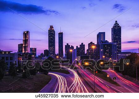 Stock Photography - USA, Georgia, Atlanta, City skyline at dusk. Fotosearch