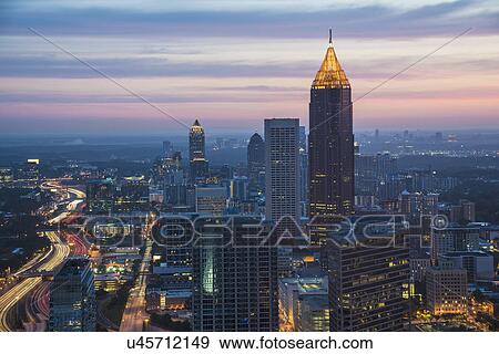 Stock Photo - USA, Georgia, Atlanta, Cityscape with skyscrapers at dawn. Fotosearch