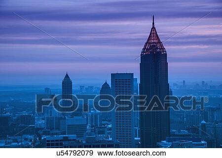 Stock Photo - USA, Georgia, Atlanta, Cityscape with skyscrapers at dawn. Fotosearch