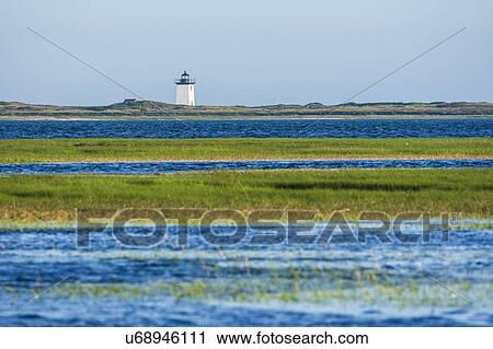 USA, Massachusetts, Cape Cod, Provincetown, Bay of water with lighthouse View Large Photo Image Stock Image - USA, Massachusetts, Cape Cod, Provincetown, Bay of water with lighthouse. Fotosearch