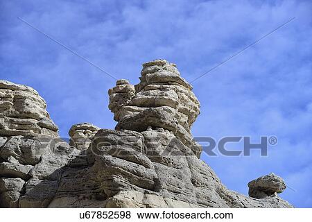 Stock Photo - USA, New Mexico, Abiquiu, Low angle view of limestone rock formations. Fotosearch