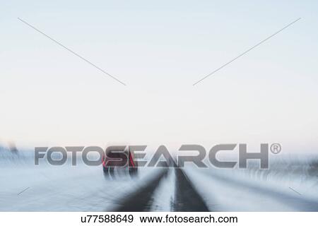 USA, New Mexico, Car on snowy highway View Large Photo Image Stock Photo - USA, New Mexico, Car on snowy highway. Fotosearch