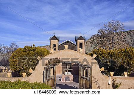 USA, New Mexico, Chimayo, El Santuario de Chimayo among trees and mountains View Large Photo Image Stock Photo - USA, New Mexico, Chimayo, El Santuario de Chimayo among trees and mountains. Fotosearch