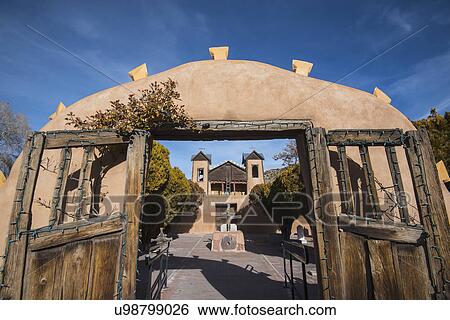 USA, New Mexico, Chimayo, El Santuario de Chimayo seen through gate View Large Photo Image Stock Photograph - USA, New Mexico, Chimayo, El Santuario de Chimayo seen through gate. Fotosearch
