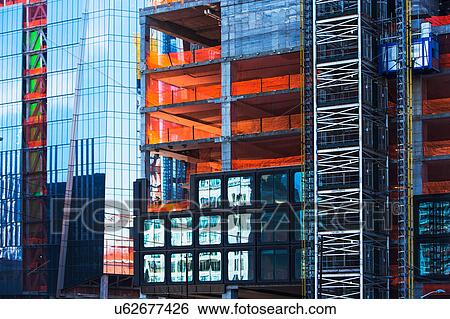 Stock Photograph - USA New York, New York City, Office buildings under construction. Fotosearch