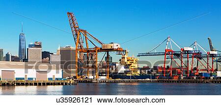 Stock Image - USA, New York State, New York City, Commercial dock. Fotosearch