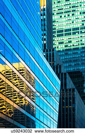 Stock Image - USA, New York State, New York City, Detail of office building facade. Fotosearch