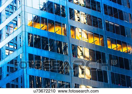 Stock Image - USA, New York State, New York City, Detail of office building facade. Fotosearch