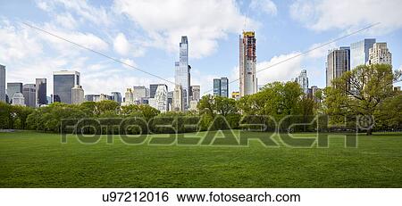 Stock Photograph - USA, New York State, New York City, Manhattan skyline with Central park in foreground. Fotosearch