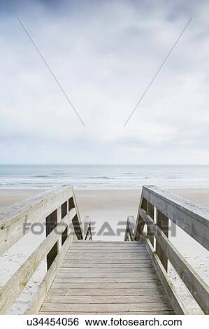 Stock Photograph - USA, North Carolina, North Topsail Beach, Quiet season at beach. Fotosearch