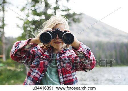 USA, Utah, Midway, Portrait of boy (6-7) looking through binoculars View Large Photo Image Stock Image - USA, Utah, Midway, Portrait of boy (6-7) looking through binoculars. Fotosearch